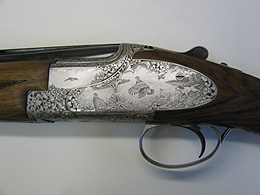 Left hand view of engraved Peter Masters gun