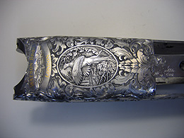 Close-up of engraved Watson Bros gun showing wild fowl picture design