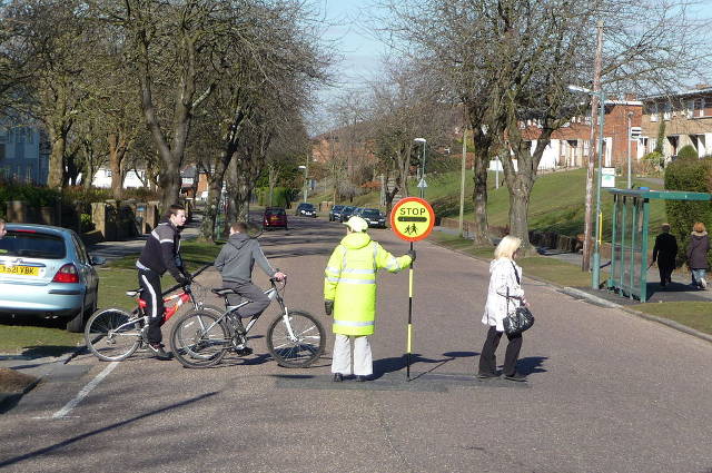 Lollipop Lady, Bournemouth (image by Lewis Clarke). Could laser etching lead to illuminated lollipop signs?