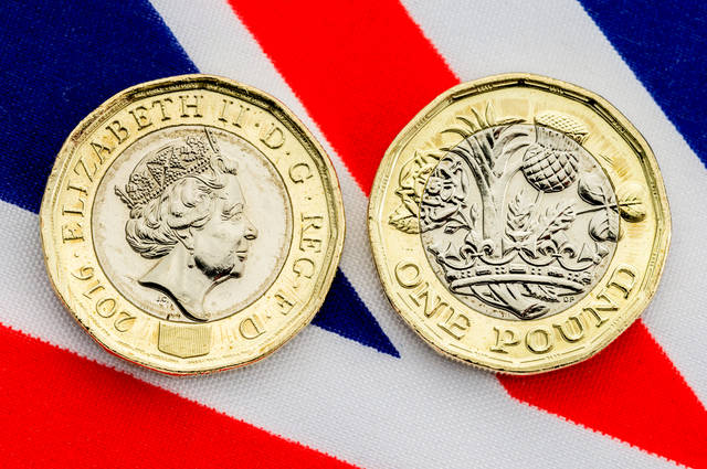 Royal Mint post Pound coin image by Linda Bestwick (via Shutterstock).